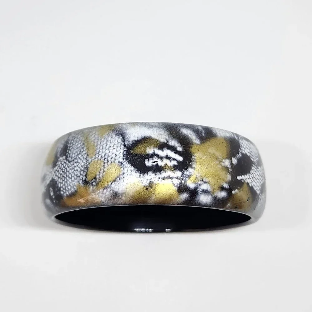 Gold, black and white Bangle